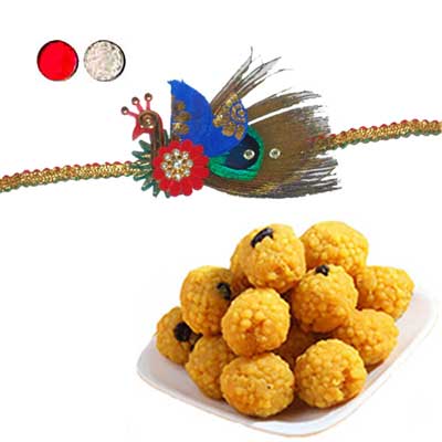 "Designer Fancy Rakhi - FR- 8520 A (Single Rakhi), 500gms of Laddu - Click here to View more details about this Product